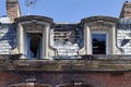 Red brick townhouse ravaged by the flames Royalty Free Stock Photo