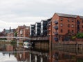 Apartments and bars next to the river aire on calls landing in leeds