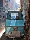 Ape car blue parked borgo Royalty Free Stock Photo