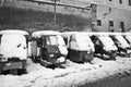 Ape Piaggio parked in the snow. Royalty Free Stock Photo