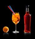 Aperol spritz bottle with orange and straw Royalty Free Stock Photo