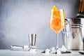 Aperol spritz classic alcoholic cocktail in wine glass, summer Italian low alcohol cold drink. Prosecco bottle in ice bucket on Royalty Free Stock Photo