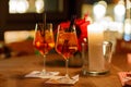 Aperol Spritz Cocktai on table with ice cubes and Royalty Free Stock Photo
