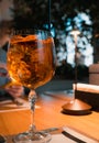 Aperol Spritz - cocktail in a beautiful glass - cocktail in warm light