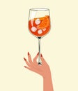 Aperol Spritz Cocktail in glass with hand. Hand drawn alcohol drink with orange slice and ice. Retro style. Vector Royalty Free Stock Photo