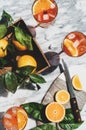Aperol Spritz cocktail in glasses with oranges, top view Royalty Free Stock Photo