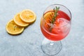 Aperol Spritz Cocktail with Orange Slice, Rosemary and Ice.