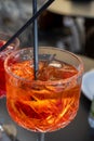 Aperol Spritz orange bitter long drink cocktail made with liqueur, prosecco sparkling wine, ice cubes and piece of orange, Milan, Royalty Free Stock Photo