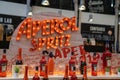 Aperol Spritz orange neon logo and display at custom bar at Time Out Market Lisbon Royalty Free Stock Photo