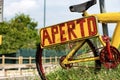 Aperto - Open Sign in Italian Language on an old bicycle Royalty Free Stock Photo