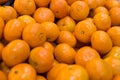 Apetitic juicy farm mandarins at market counter Royalty Free Stock Photo
