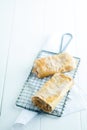 Apfelstrudel or apple strudel on a wire rack Royalty Free Stock Photo