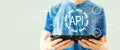 API - application programming interface concept with man using a tablet Royalty Free Stock Photo