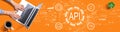 API - application programming interface concept with person using a laptop Royalty Free Stock Photo