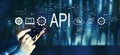 API - application programming interface concept with person using smartphone Royalty Free Stock Photo