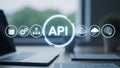 API Concept Digital Interface Icons, Software Development, Data, AI on Modern Office Desk Laptop Royalty Free Stock Photo