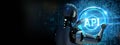 API - Application Programming Interface. Software development tool. Robot pressing button on virtual screen. 3d render Royalty Free Stock Photo
