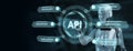 API - Application Programming Interface. Software development tool. Robot pressing button on virtual screen. 3d render Royalty Free Stock Photo