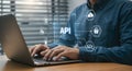 Api integration and development concept using laptop for software and application programming interface 100 Royalty Free Stock Photo