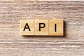 API word written on wood block. application program interface text on table, concept Royalty Free Stock Photo