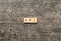 API word written on wood block. application program interface text on table, concept Royalty Free Stock Photo