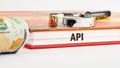 API (application program interface). The concept of technology and development. Phrase, words, text API on the Royalty Free Stock Photo