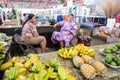 Apia, Samoa - October 27, 2017: female stallholders selling fruit at Fugalei fresh produce market Royalty Free Stock Photo