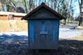 An apiary with old wooden hives in a rural garden Royalty Free Stock Photo