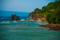 Apo island, Philippines, the view from the top: sea, rocks and boats. Royalty Free Stock Photo