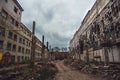 Apocalyptic concept, ruins of abandoned city, old broken factory or warehouse buildings