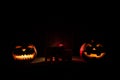 Apocalyptic Halloween scenery with old house pumpkin. Horror zombie near the abandoned house. Halloween.