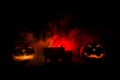 Apocalyptic Halloween scenery with old house pumpkin. Horror zombie near the abandoned house. Halloween.