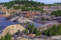 Apocalyptic landscape like a planet Mars surface. Fantastic view of blue lake. Solidified red-brown black Earth surface. Barren, Royalty Free Stock Photo