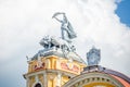 Apollo statue on a chariot pulled by lions on the Cluj Napoca National Theatre Baroque building