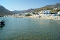 APOLLON, NAXOS, GREECE - Aug 25, 2013: Charming Apollon town at Naxos island. View of the beach on a summers day