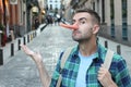 Apologetic man with a very long nose outdoors Royalty Free Stock Photo