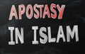 APOSTASY IN ISLAM text related to the type of discrimination written on a blackboard Royalty Free Stock Photo