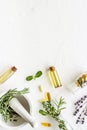 Apothecary of natural wellness and self-care. Herbs and medicine on white background top view frame copy space Royalty Free Stock Photo