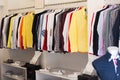 Apparel store with men shirts on hangers Royalty Free Stock Photo