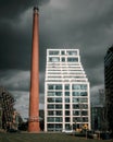 Appartment building and an old chimney in the Strijp-S area in Eindhoven the Netherlands