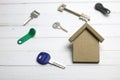 Appartment key on wooden background Royalty Free Stock Photo