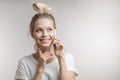 Beautiful smiling blond woman talking by cell mobile phone. Closeup. Isolated. Royalty Free Stock Photo