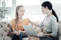 Appealing female psychologist calming down teen girl Royalty Free Stock Photo