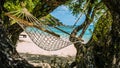 Appealing Hammock between bizarre Trees , Haad Rin , Koh Pangang Royalty Free Stock Photo