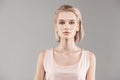 Appealing young lady with bob haircut and grey eyes