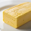 And appears fresh showcasing its solid form typical of butter used Royalty Free Stock Photo