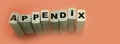 Appendix word written on wood block. appendix text on table, concept Royalty Free Stock Photo