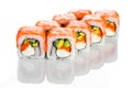 Appetising japanese cuisine salmon sushi roll with avocado and red caviar isolated on white Royalty Free Stock Photo