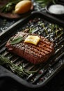 Appetite: Big beef steak, perfectly roasted with rosemary herbs and pepper, sizzling on a cast iron grill pan. Enhanced with Royalty Free Stock Photo