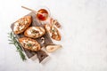 Appetizer bruschetta with pear, honey, walnut and cottage cheese on white board. Appetizers table with italian antipasti snacks. Royalty Free Stock Photo